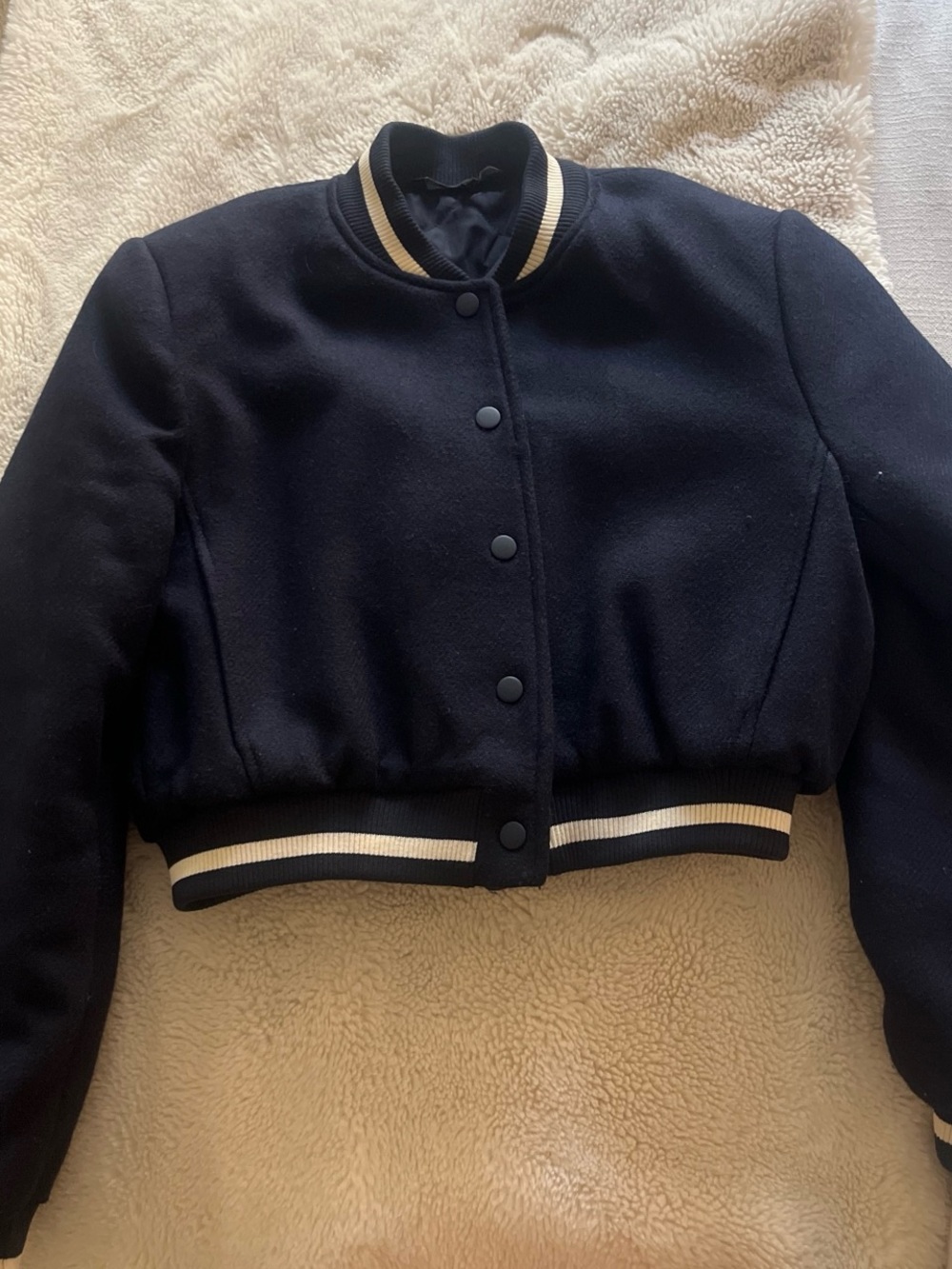 Dark blue varsity jacket